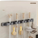 Suporte de Parede para Vassouras e Rodos – Organização Prática e Segura!